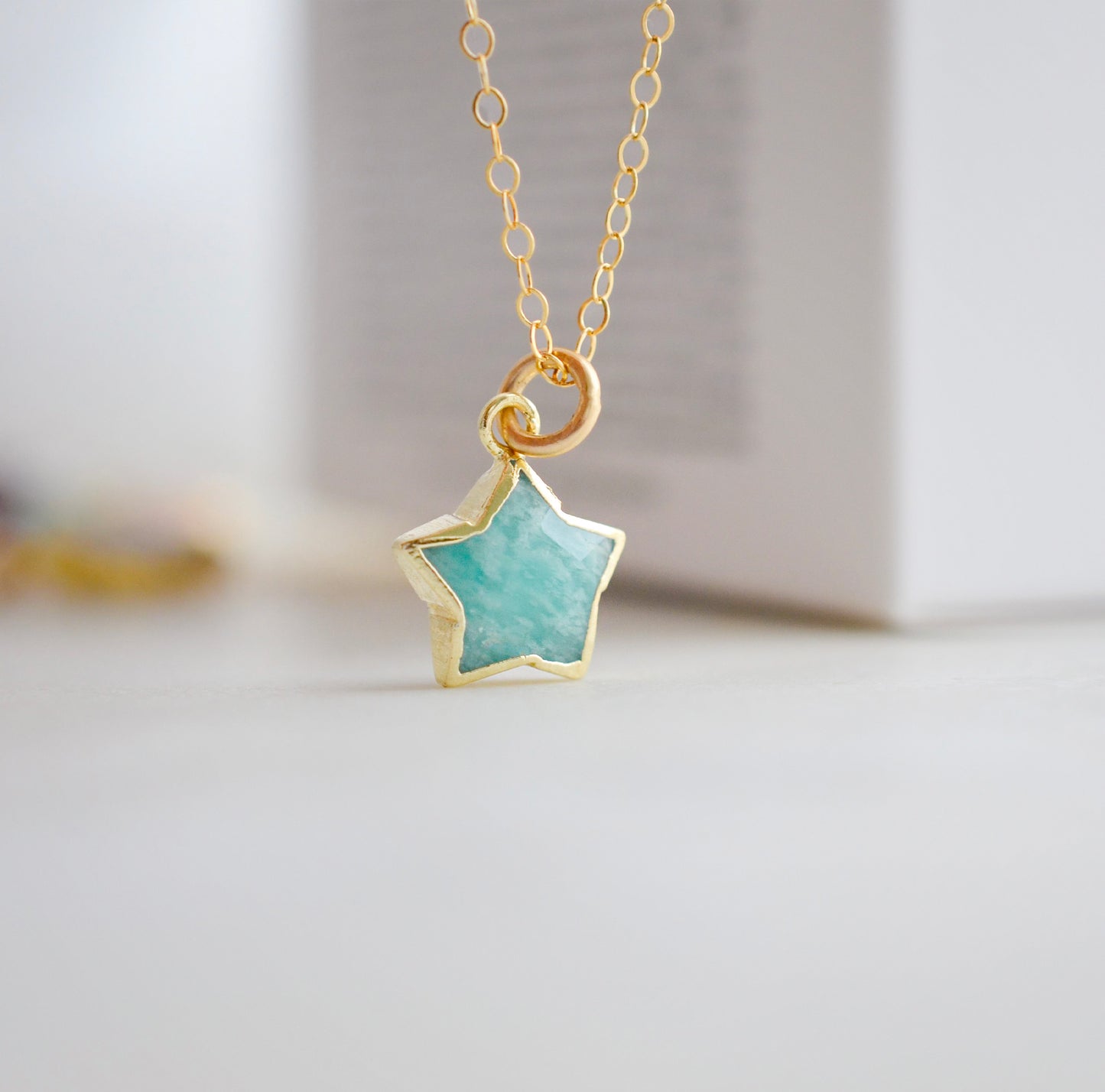Dainty, natural aqua amazonite celestial stone star pendant set on a 14k gold filled chain. This necklace is a great gift for stargazers, girlfriends, mom, wife, or daughter.