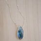 Labradorite Teardrop Necklace, Genuine labradorite bezeled in gold and suspended from a gold chain. Handmade by GEMNIA.
