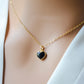 Black onyx heart pendant set on a 14k gold filled chain necklace.