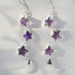 Three natural purple amethyst gemstone stars dangle atop rainbow moonstone crescent moons in these earrings. Shown in sterling silver.