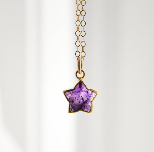 Dainty purple amethyst star necklace in gold filled.