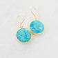 Handmade real Turquoise dangle earrings with gold hooks. The stone is smooth polished and set in vermeil bezels. Also available in sterling silver. Handcrafted in Connecticut.