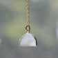 This necklace is handmade with a natural white druzy quartz pendant in a half-circle or crescent shape. Available in 14k gold filled.