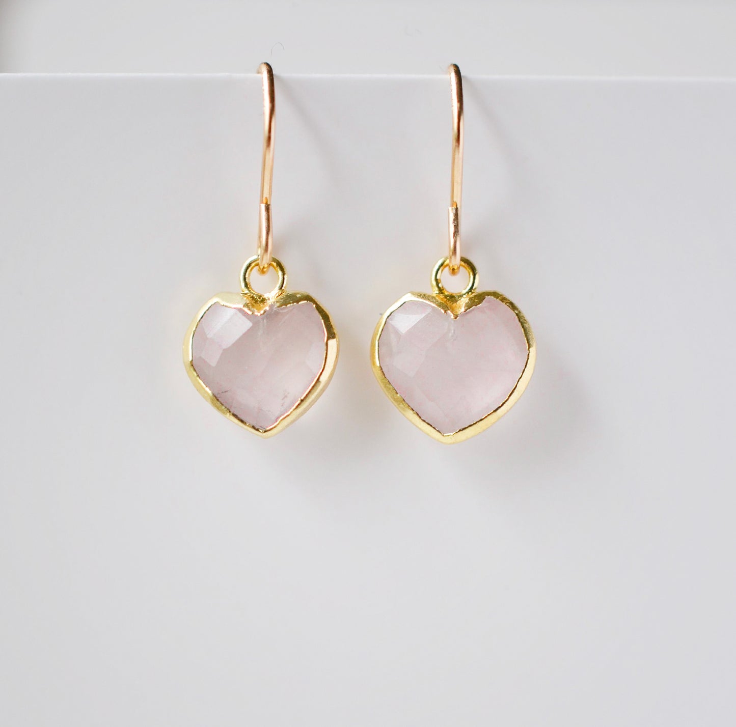 Handmade pink rose quartz gemstone earrings shown in 14k gold filled. Also available in sterling silver.
