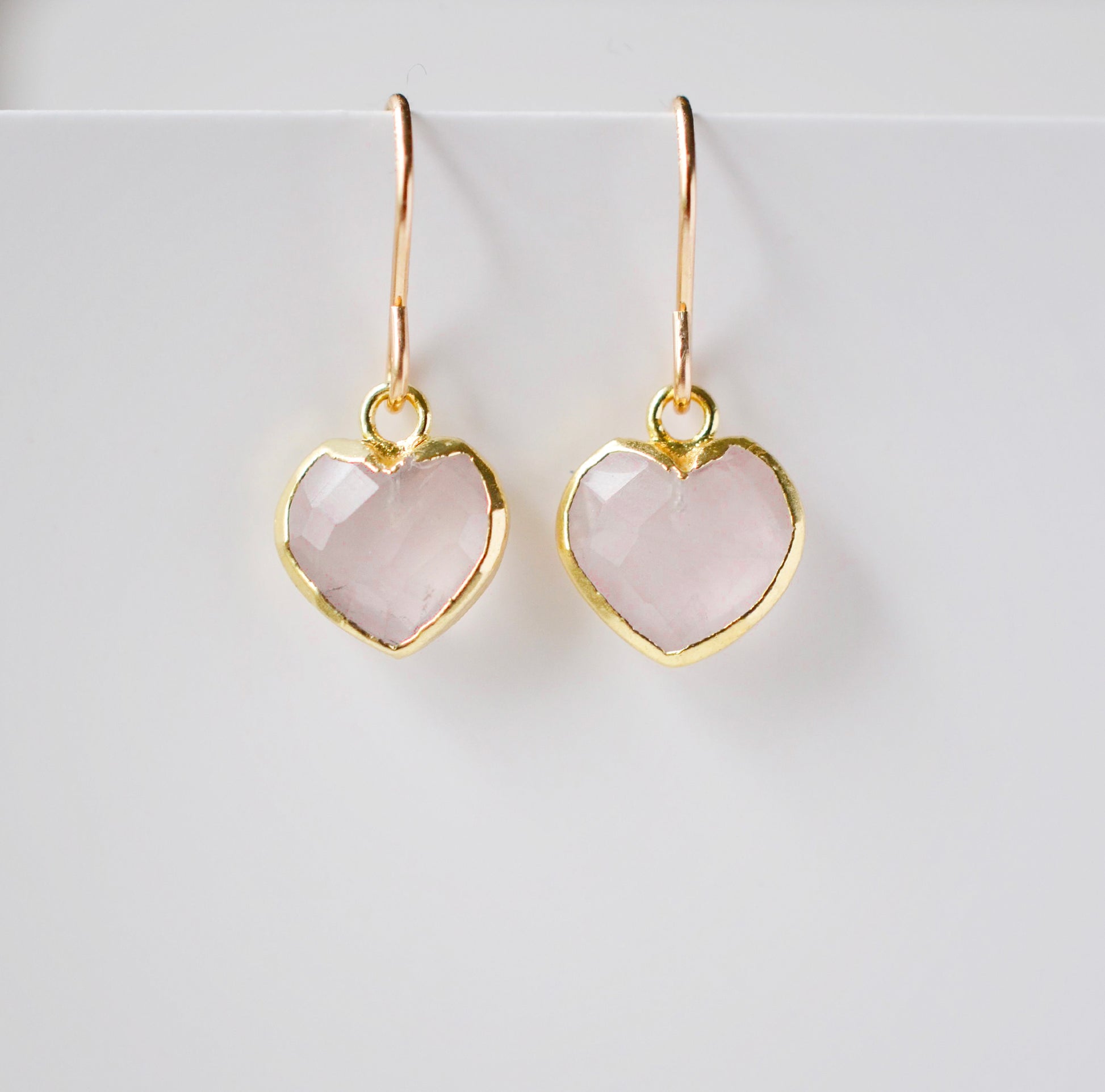 Handmade pink rose quartz gemstone earrings shown in 14k gold filled. Also available in sterling silver.