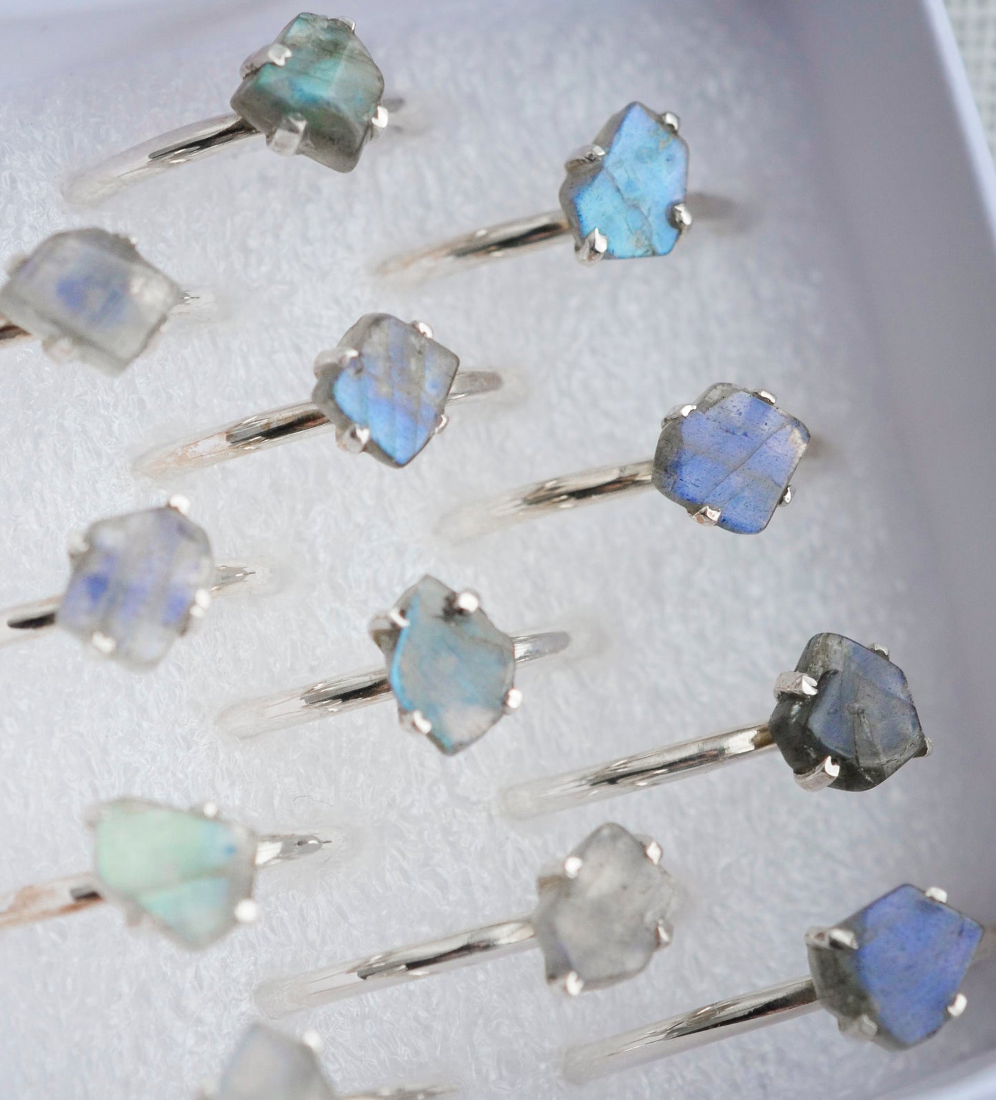 Group image of the different varieties of labradorite shapes. The band is sterling silver.