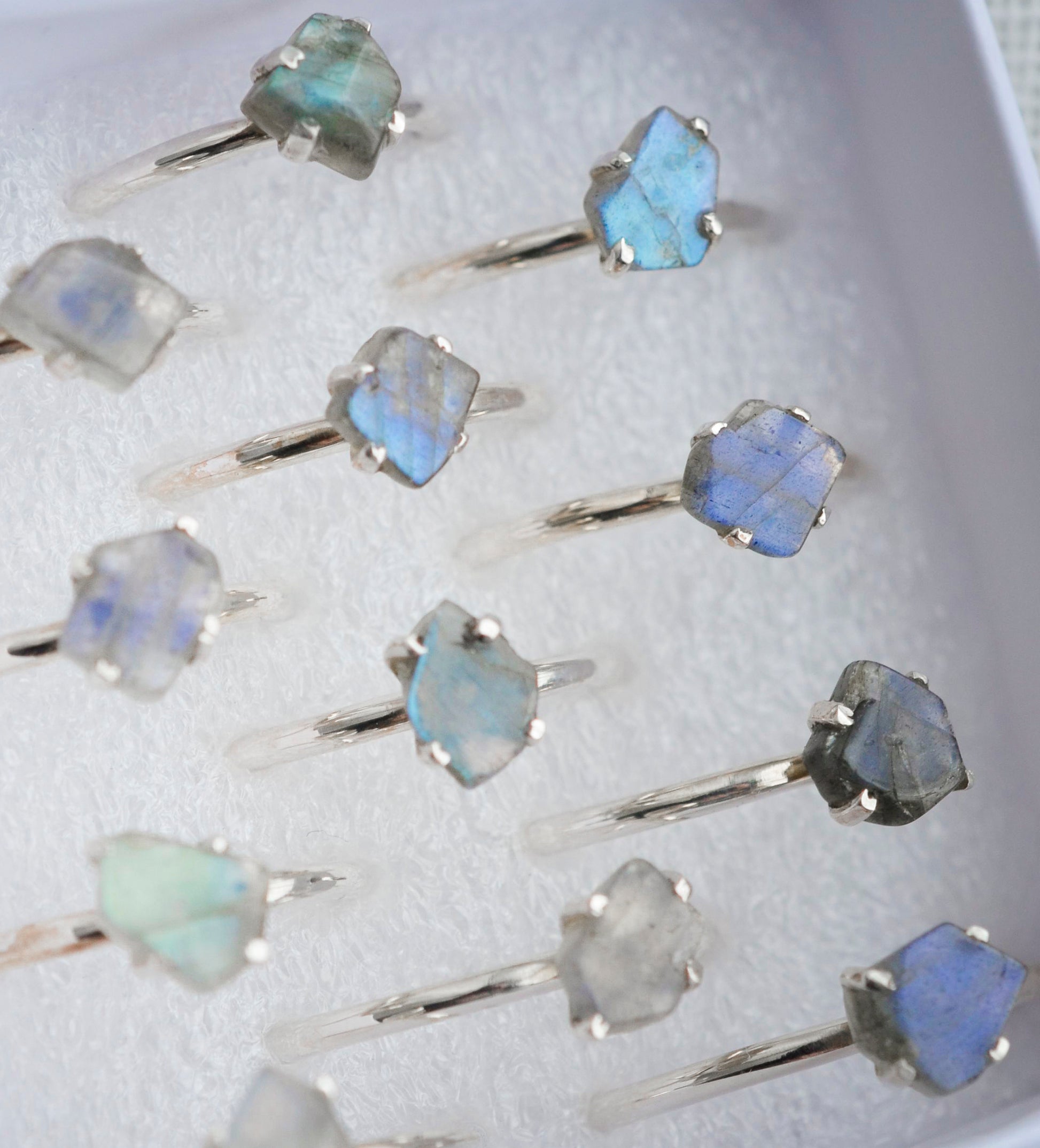 Group image of the different varieties of labradorite shapes. The band is sterling silver.