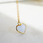 Natural handmade rainbow moonstone heart-shaped pendant necklace with 14k gold filled chain. Handmade in New England by Gemnia Jewelry. 