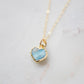 Genuine, real, blue Larimar stone heart necklace. The stone is bezeled in gold and set on a 14k gold filled cable chain. This pendant is a great romantic gift for wife, girlfriend, or valentine's day.