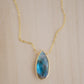 Labradorite Teardrop Necklace, Genuine labradorite bezeled in gold and suspended from a gold chain. Handmade by GEMNIA.