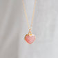 Handmade necklace with a natural pink opal heart-shaped pendant on a 14k gold filled chain. Handcrafted dainty gemstone jewelry by Gemnia.