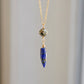 This necklace is handmade with natural pyrite and lapis lazuli suspended from a 14k gold filled or sterling silver chain.