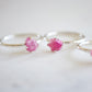 Raw Pink Tourmaline crystals set onto sterling silver rings. Showing two rings. 