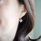 Aqua blue Amazonite gemstone heart earrings in gold. Modeled image. Natural Stones.