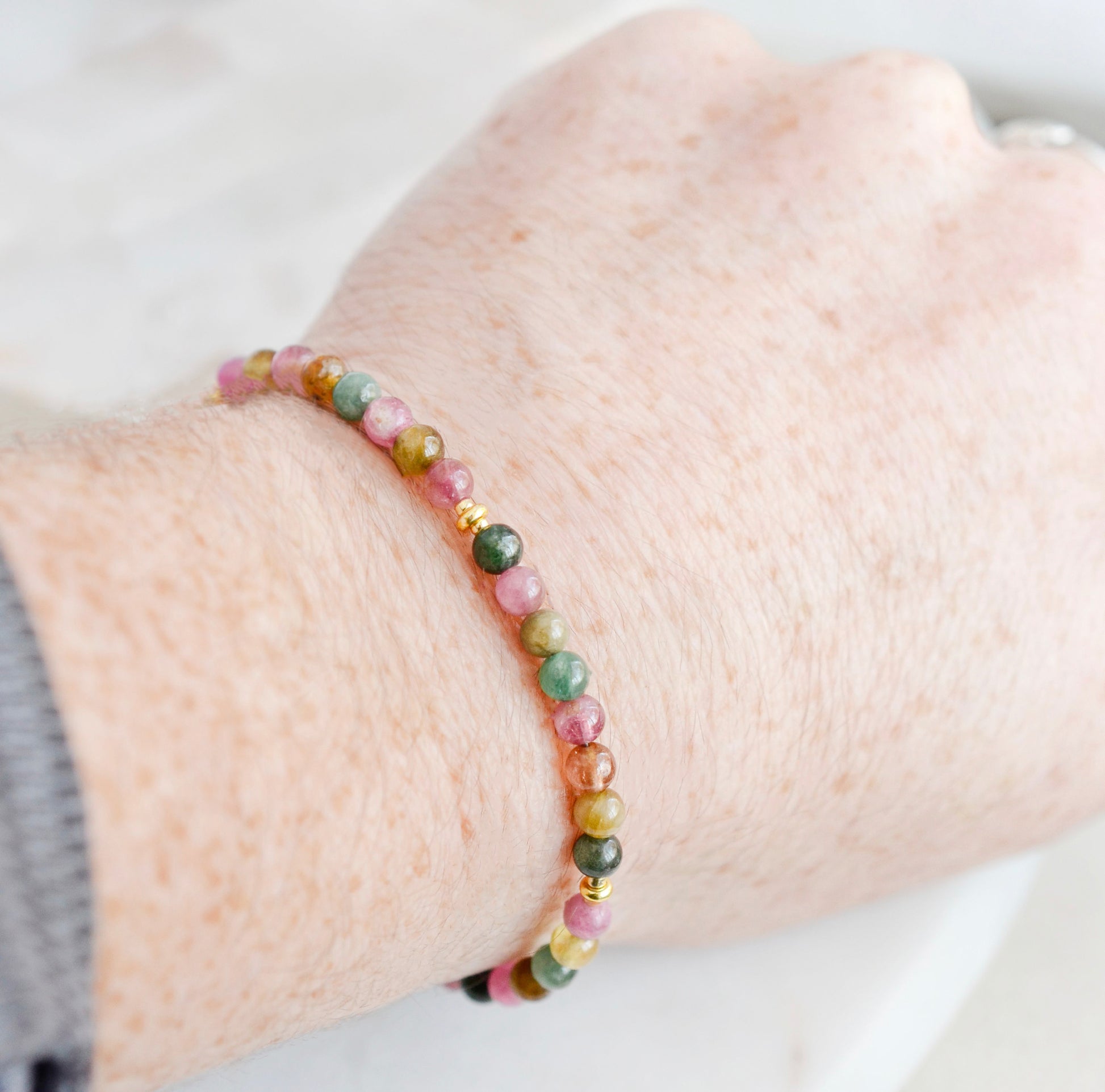 Watermelon Tourmaline beaded bracelet with 4mm stones. Modeled image. 