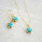 Natural blue turquoise star pendant on a 14k gold filled chain shown with matching earrings.