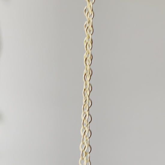 Video of pink Rhodochrosite pendant in gold.