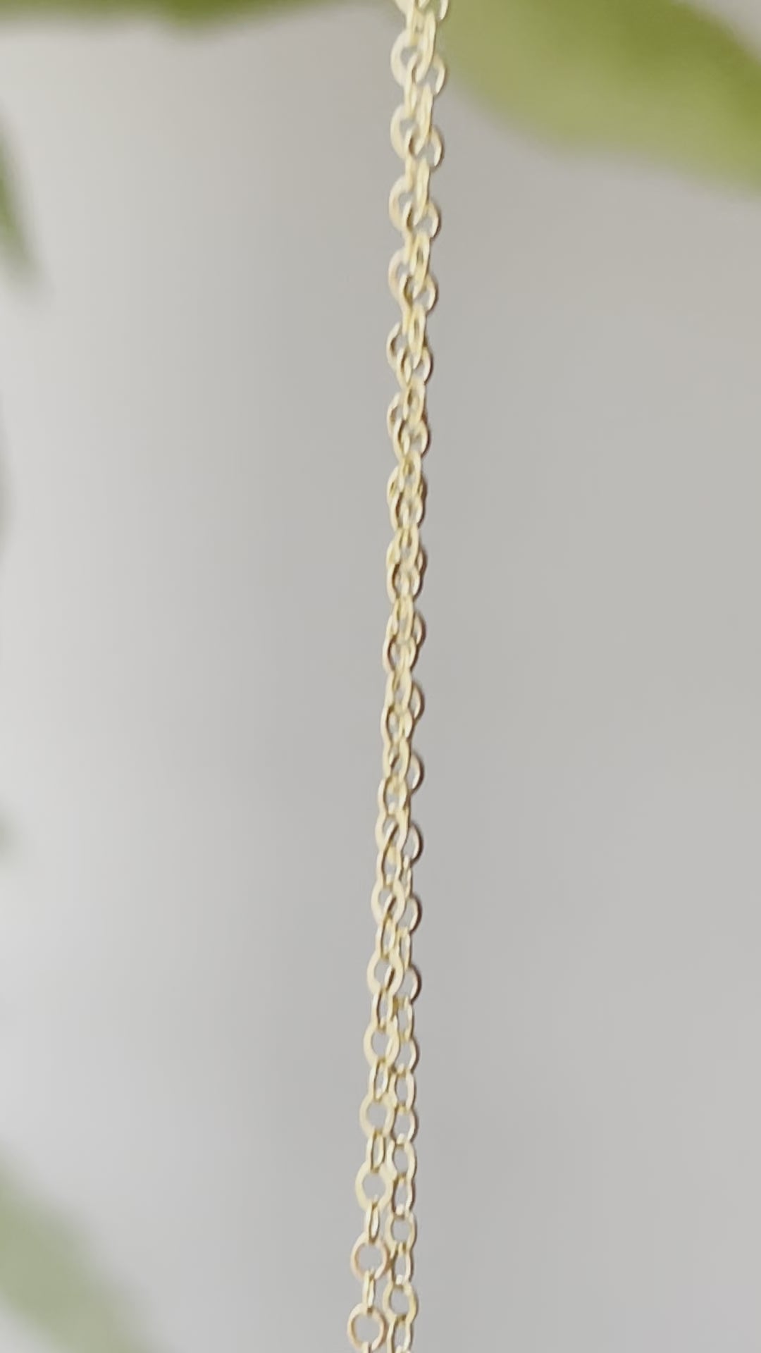 Video of pink Rhodochrosite pendant in gold.