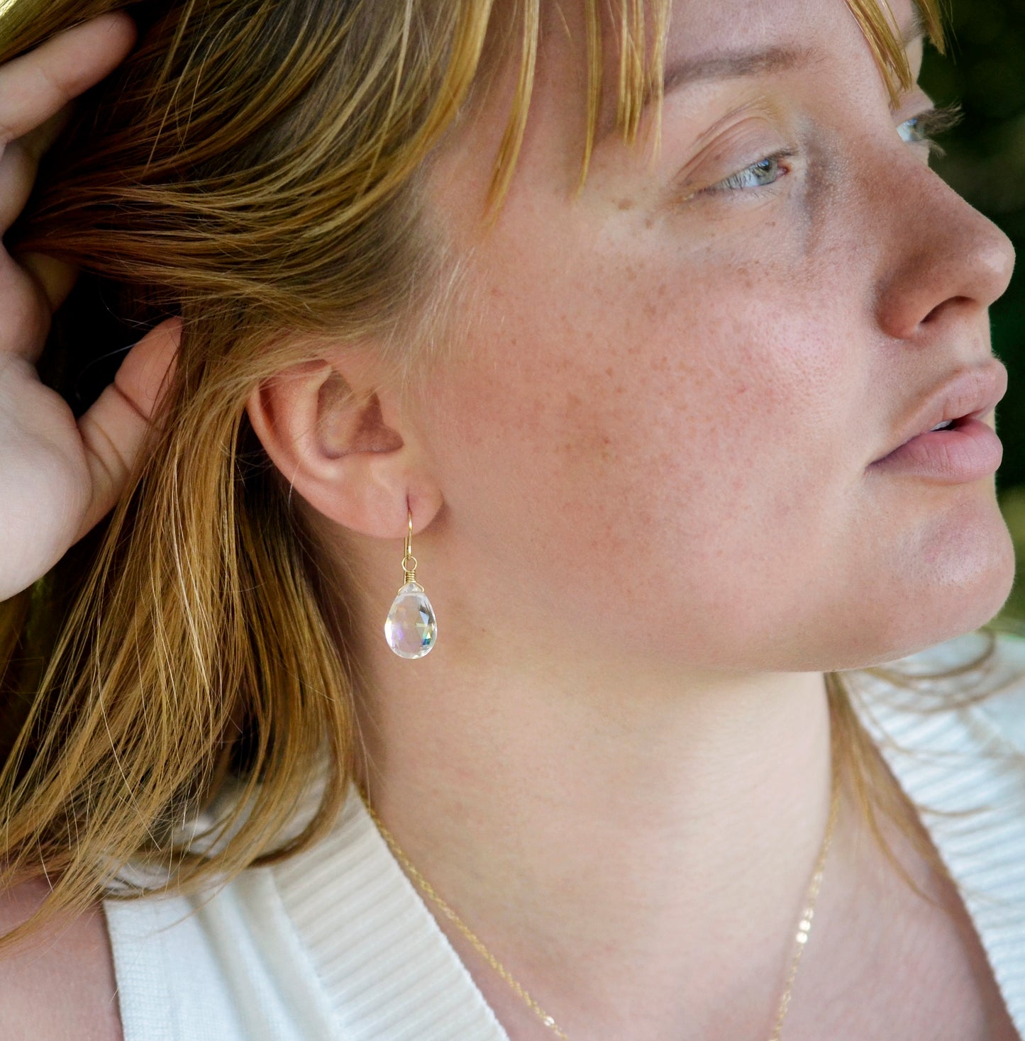 Rainbow Mystic Topaz Teardrop Earrings. Modeled Image in gold.