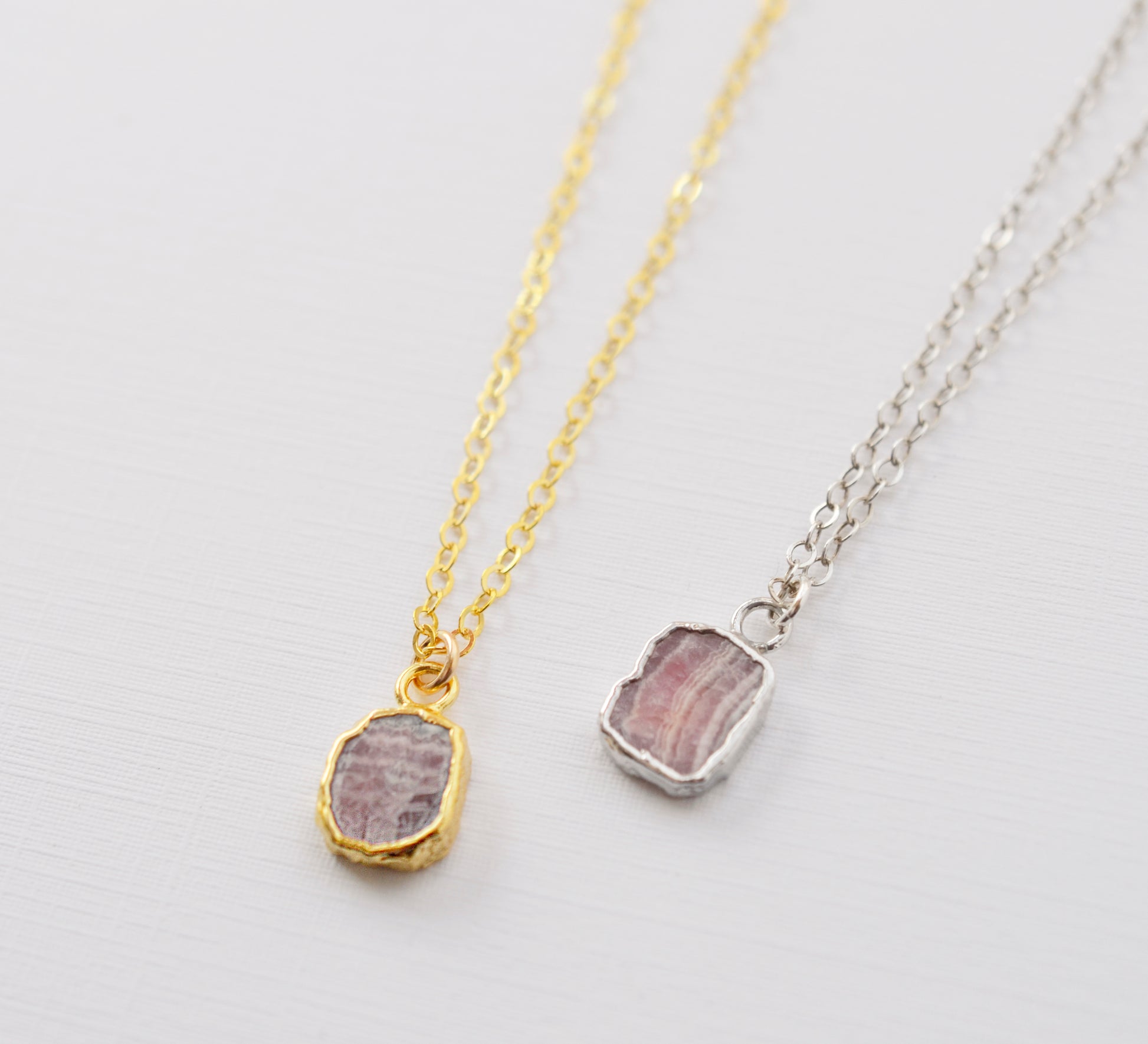 Pale pink Rhodochrosite smooth polished slice set in gold or silver.